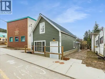 Step into a piece of Rossland history with this beautifully renovated 1901 home, perfectly located i...