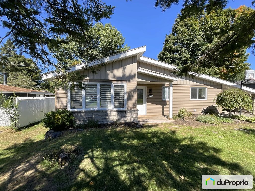$595,000 - Bungalow for sale in Prevost — photo 1