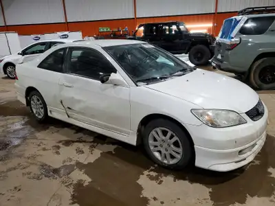 Snow Leopard Auto is parting out this white 2005 Honda Civic Coup in run and drive condition Most of...