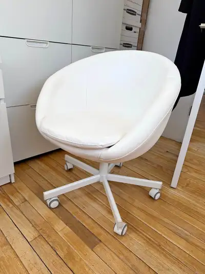 6 white IKEA office chairs. Used., View more