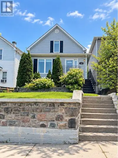 Beautifully renovated traditional home blending timeless charm with modern updates. Hardwood floors...