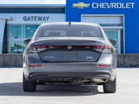 The 2024 Honda Accord Hybrid Touring commands attention in a refined Grey finish that highlights its... (image 5)
