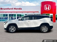 Elevate your daily drives with this impressive white 2023 GMC Terrain SLE Sport Utility, showing jus... (image 1)