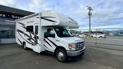 This is a very well built, equipped and maintained compact Class C with walkaround queen bed! Built...