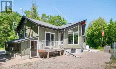 This custom built executive home offers lots of privacy sitting on 29 acres of nature backing onto a...