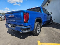 For a quick response please text 403-820-9940. AMVIC licensed business The 2023 GMC Sierra 1500 AT4... (image 5)