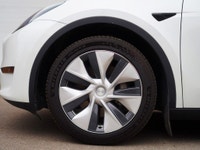 Check out this sleek 2021 Tesla Model Y! With its Long Range trim, AWD capability, and luxurious fea... (image 7)