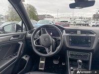 This Volkswagen Tiguan delivers a Intercooled Turbo Regular Unleaded I-4 2.0 L/121 engine powering t... (image 8)