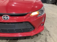 Le Scion tC 2016 usagé proposé par AutoStudio 72 à Mirabel mise sur une conduite engageante avec sa... (image 7)