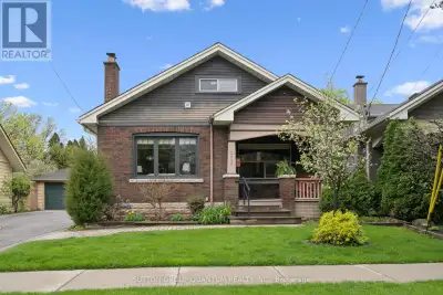 Cottage in the City! Don't miss out on the unique opportunity to own this classic 1.5 Story Craftsma...