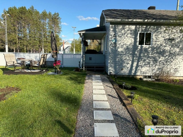 $400,000 - Triplex for sale in Amherst — photo 1