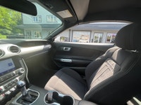 The 2020 Ford Mustang EcoBoost Convertible is a true standout in a pristine white finish, offering t... (image 9)