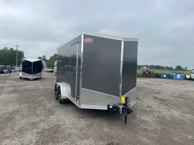 IRON SERIES 7' X 14' ENCLOSED CARGO WITH REAR RAMP DOOR AND 12in. EXTRA HEIGHT UPGRADES! The Iron Se...