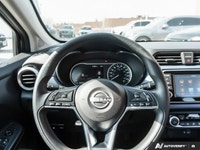 Navigate cityscapes with confidence in this sophisticated former daily rental 2024 Nissan Versa SV.... (image 9)