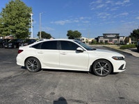 Experience the refined elegance and exhilarating performance of this 2023 Honda Civic Sedan Touring,... (image 1)