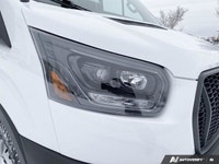 Introducing the 2026 Ford Transit Cargo Van, a powerhouse wrapped in a pristine White exterior and e... (image 7)