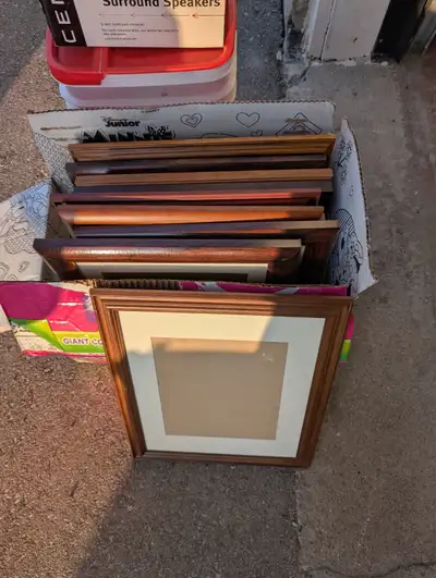 Box of wooden picture frames. Approximately 16 x 21 sizes 5$ each. Discount for multiple frames Pick...