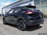 This 2022 Nissan Kicks SV, boasting a sleek Super Black exterior and a stylish charcoal interior, is... (image 2)