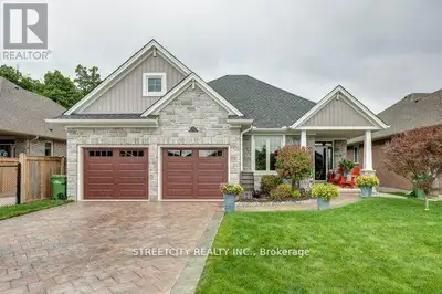 This stunning home in Mitchell Hepburn school district backs onto a beautiful treed space and the wa...