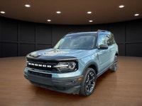 The 2021 Ford Bronco Sport Outer Banks in a striking blue finish with its capable 4x4 drivetrain off... (image 1)