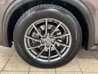 "I didnt expect an SUV to feel this composed and artful," says Maya R., a recent QX50 owner. "Every... (image 8)