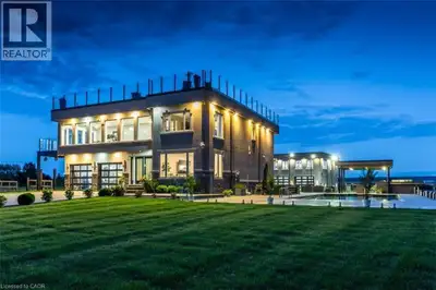 Experience resort-style living in this extraordinary estate overlooking Lake Ontario. Nestled among...