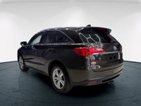 The 2015 Acura RDX in striking AWD configuration boasts an impressive handling prowess. This sophist... (image 6)