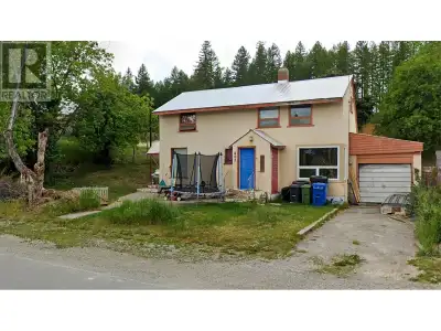 Great location for this cute 2-storey 3BR, 1 bath townsite home. Directly opposite Triangle Park and...