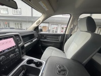 The 2022 Ram 1500 Classic Express, presented in a pristine white finish, is equipped with a robust 4... (image 8)