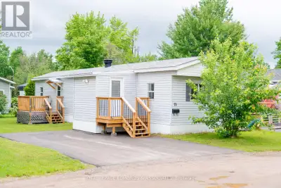 Welcome to this impeccably maintained, turn-key mobile home offering comfortable, low-maintenance li...