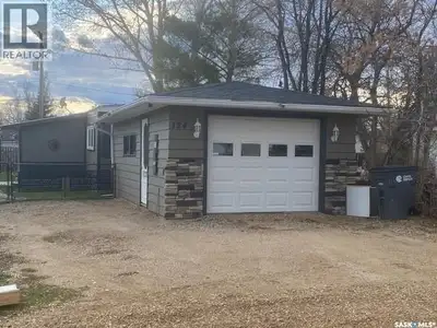 If you are looking for one of the largest AND fenced lots in the Caronport Mobile Home Park, then yo...