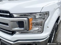 Experience the rugged elegance of the 2020 Ford F-150 XLT 4WD SuperCab 6.5' Box, presented in a stri... (image 7)