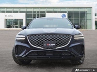 * 21-inch sport alloy wheels, dark-tinted radiator grille, unique front/rear bumpers, and large exha... (image 7)