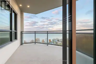 VIEW, VIEW, VIEW! Bright luxury corner unit with stunning lake views and plenty of natural light thr...