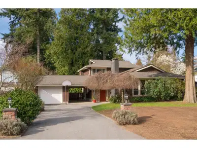 STUNNING Beautifully updated 4 bedroom, 3 bathroom, 3 level split in fantastic Brookswood neighborho...
