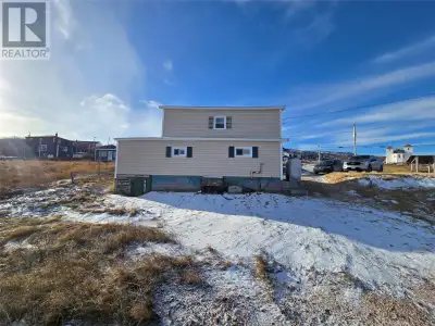 Charming Two-Story Home in Historic Grates Cove - New Survey and clear title Nestled in the pictures...