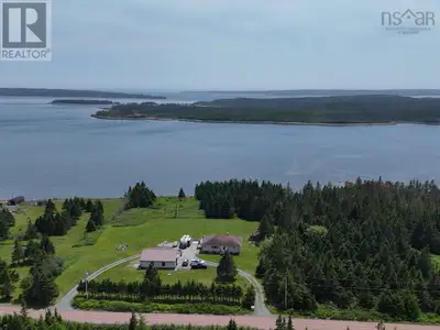 Spacious 4 bedroom bungalow on 4.56 acres with 300 feet of ocean frontage on the sparkling waters of...
