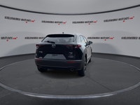 // ACCIDENT FREE!! // Finished in Black with a Burgundy interior, this used 2022 Mazda CX-30 GT w/Tu... (image 6)