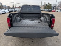 The 2026 Ram 2500 Limited Mega Cab Night Edition in Diamond Black Crystal Pearl delivers bold stylin... (image 5)