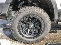 Dominate every road and task in this robust 2021 Ram 1500 Rebel Crew Cab Pickup. Dressed in striking... (image 9)