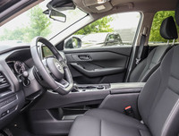 The 2023 Nissan Rogue AWD S in a sleek black hue complements its AWD capabilities, delivering a smoo... (image 8)