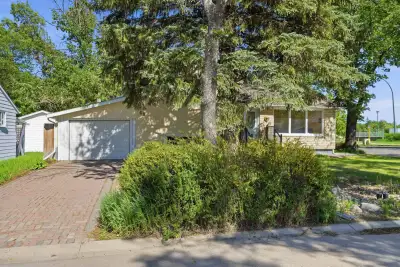 Spacious, attractive 4-level split located on a corner lot in the Hillsdale Area. Welcoming front en...