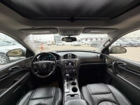 The 2013 Buick Enclave Premium AWD is a full-size luxury crossover that underwent a significant refr... (image 7)