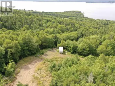 Located on a mountainside with breathtaking views over Bras d'Or Lake, this serene retreat offers a...