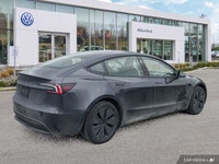 This Tesla Model 3 delivers a Electric engine powering this Automatic transmission. Window Grid Ante... (image 4)