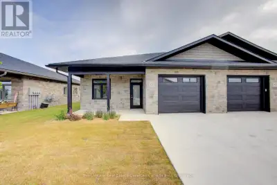 Welcome to easy, carefree living in this beautifully designed 2-bedroom, 2-bathroom bungalow condo,...