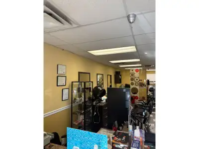 Turnkey hair salon business for sale in a high-exposure, ground-floor location with approximately 90...