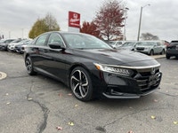 Sporting the performance-oriented 2021 Honda Accord Sedan Sport 2.0 in captivating Crystal Black Pea... (image 2)