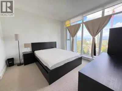 Furnished 2-bedroom, 2-bathroom high-rise apartment in Burnaby with 811 sqft of practical living spa...