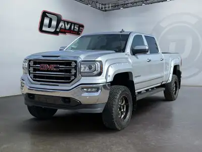 The 2018 GMC Sierra 1500s powerful profile and distinctive stance turns heads and makes a statement...